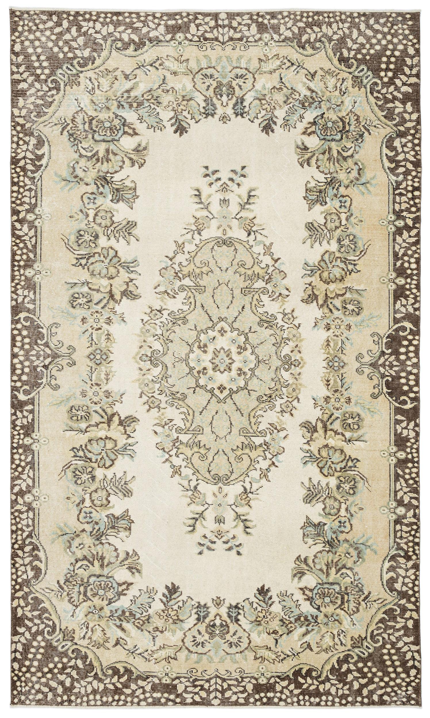 Cream and brown traditional rug with a central floral medallion and ornate border on a white background.