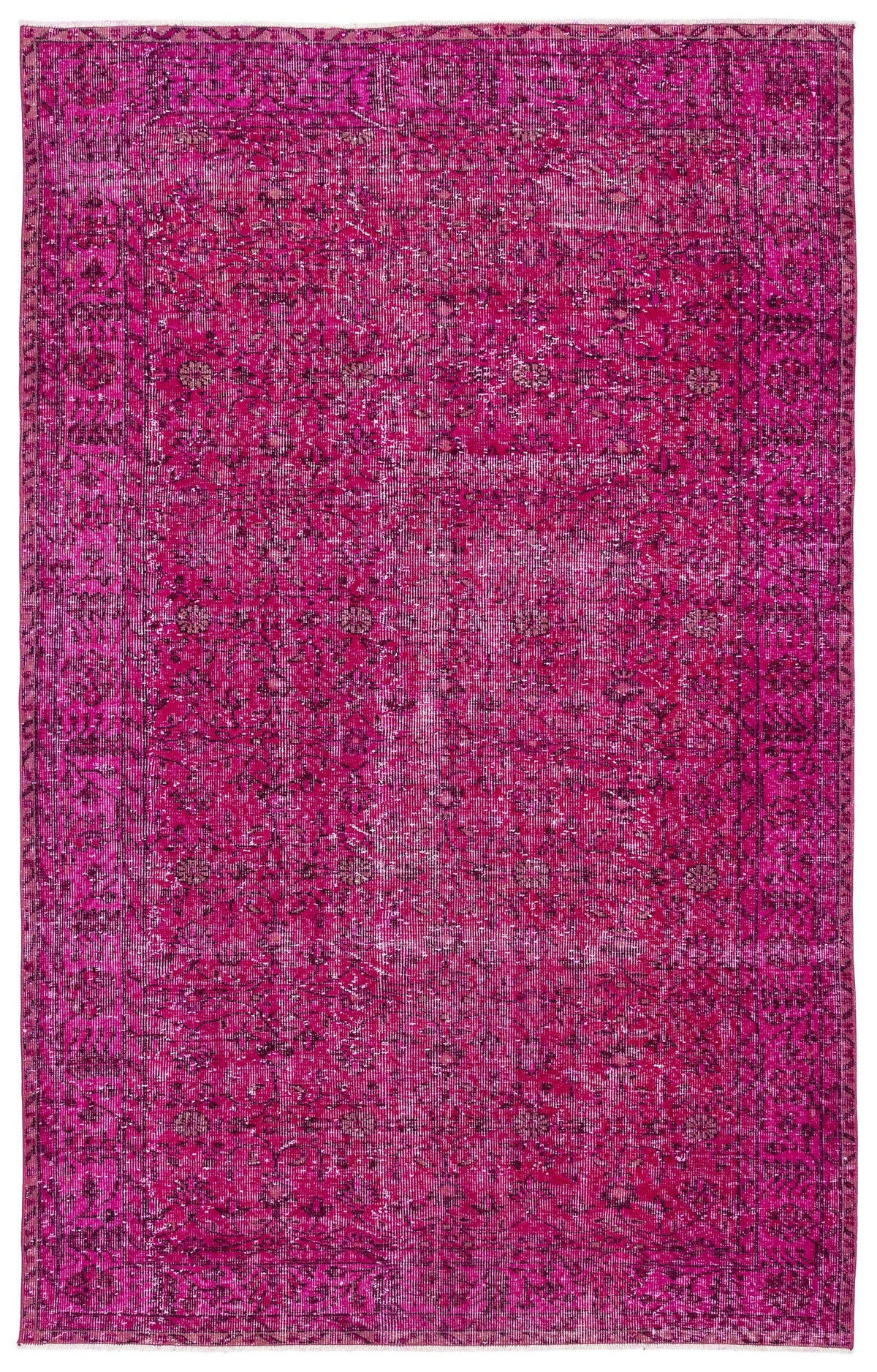 Fuchsia distressed area rug with a traditional Persian-style floral medallion pattern and a decorative border.