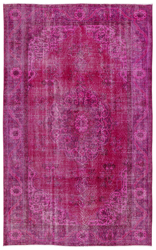 Load image 1 in gallery view. Magenta distressed area rug with a traditional central medallion and ornate border pattern.