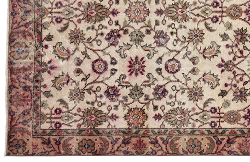 Load image 1 in gallery view. Beige traditional rug with a multi-colored floral vine pattern and a detailed decorative border.