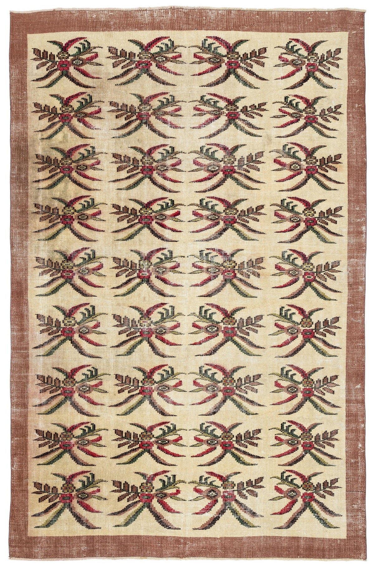 Beige rug with a repeating red and green floral motif and a solid brown border on a white background.
