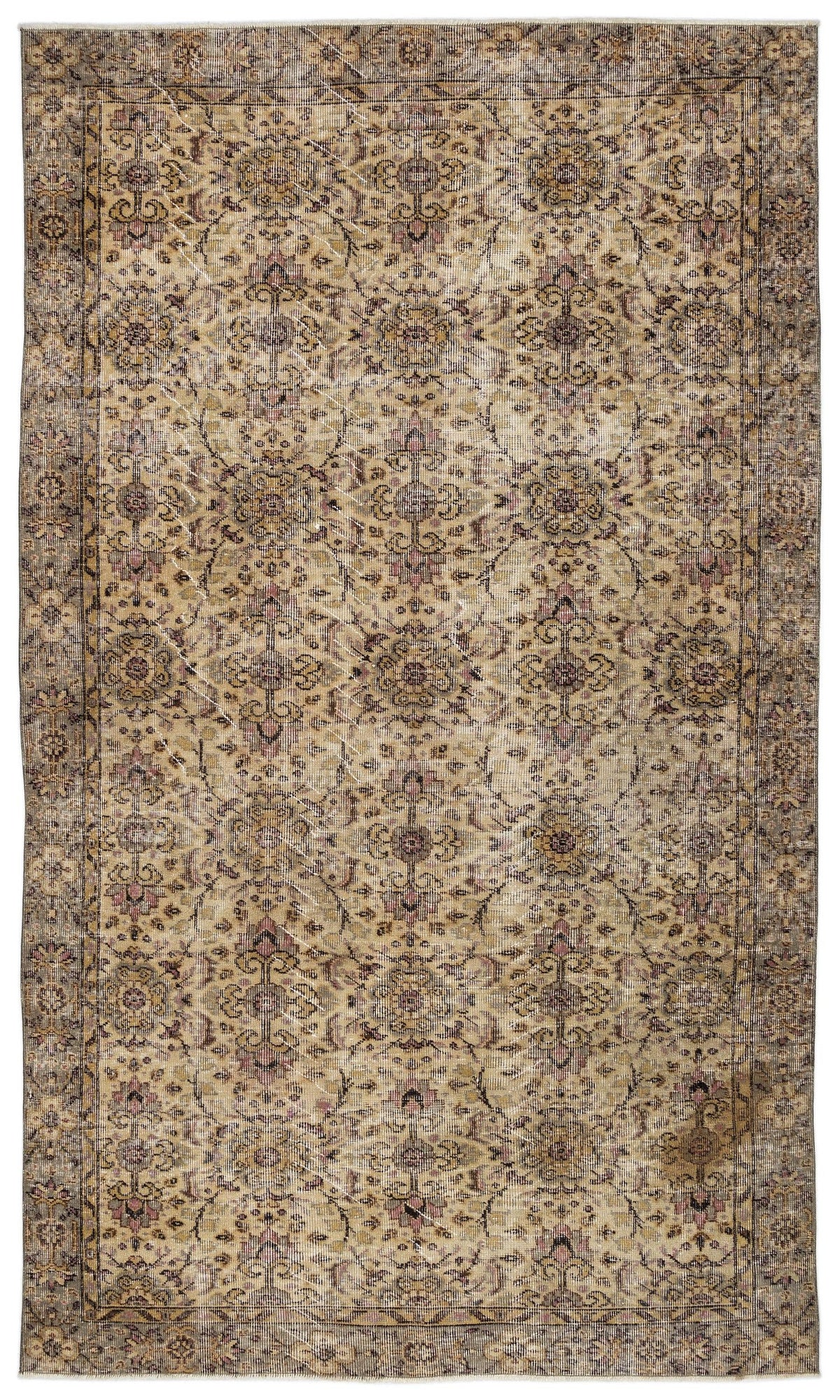 Distressed beige and brown traditional rug with a repeating floral medallion pattern and a dark border.
