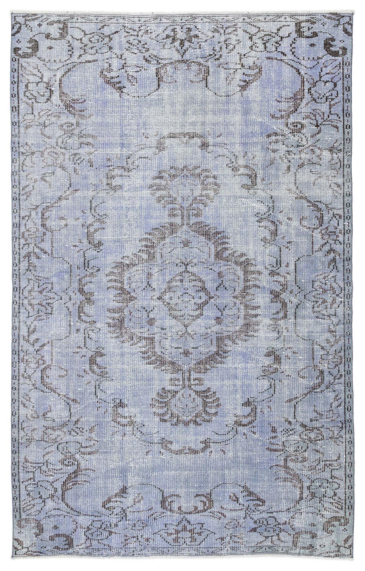 Periwinkle blue and charcoal grey vintage-style rug with a distressed central medallion and floral border.