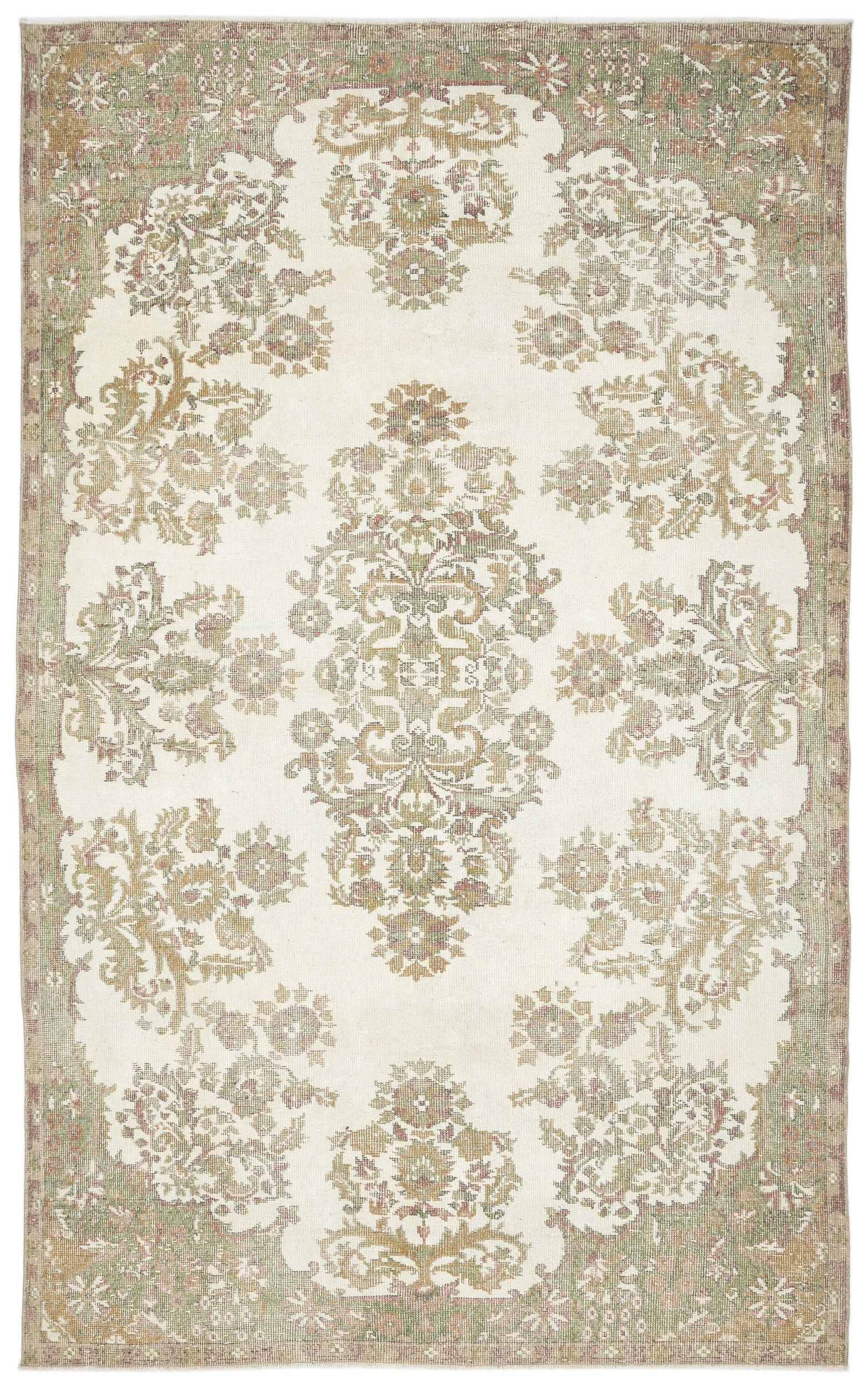 The Bofaya Vintage Medallion Rug (6'4" x 10'2") features a faded floral and vine pattern in cream, beige, and olive green with a central medallion and ornate border for timeless style.
