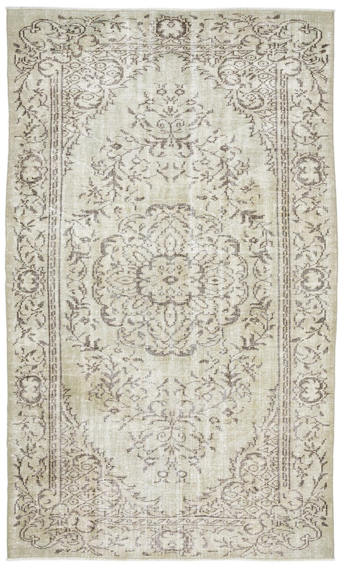 Load image 1 in gallery view. Beige and taupe vintage-style rug with a central floral medallion and ornate border on a white background.