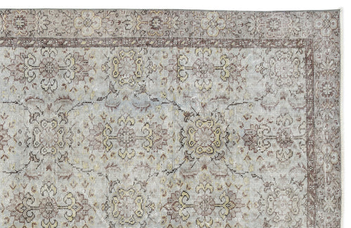 Load image 1 in gallery view. Grey and beige traditional rug with a distressed floral medallion pattern and a detailed border.