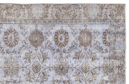 Load image 1 in gallery view. Light blue and taupe vintage-style rug with a distressed floral medallion pattern and a wide decorative border.