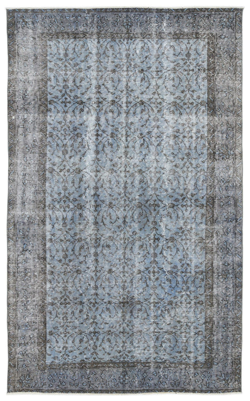 Load image 1 in gallery view. Distressed blue and charcoal grey rug with a traditional floral vine pattern and a wide decorative border.