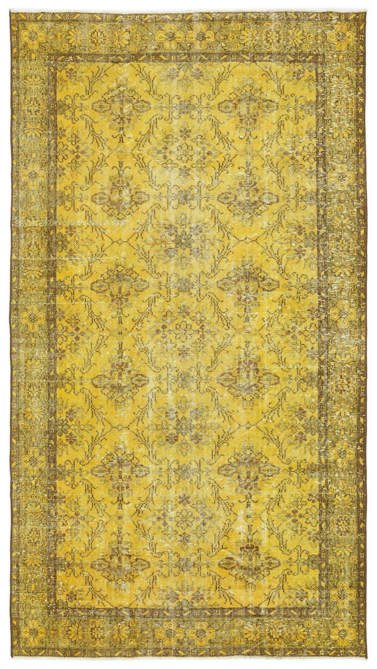 Mustard yellow and brown distressed rug with a traditional floral medallion pattern and a wide decorative border.