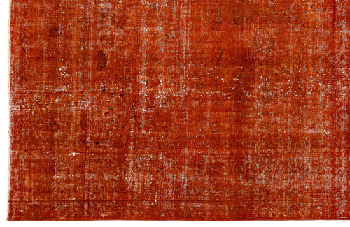 Load image 1 in gallery view. Rust-colored rug with a distressed, faded texture and subtle worn-in vintage pattern.