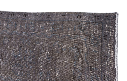 Load image 1 in gallery view. Charcoal and slate blue distressed rug with a faded traditional border pattern on a white background.