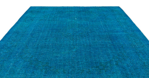 Load image 1 in gallery view. Solid bright blue vintage-style rug with a distressed, weathered texture on a white background.