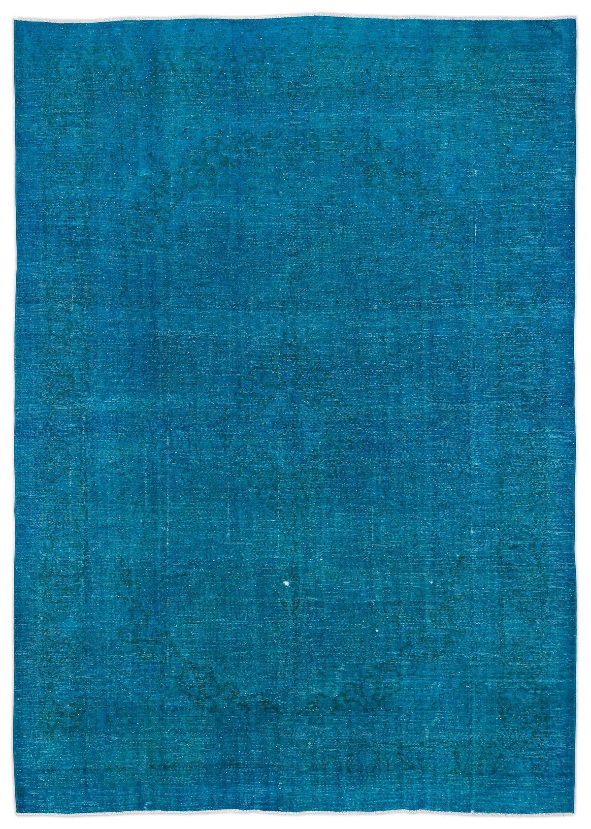 Solid teal distressed-style rug with a faint, worn-in traditional medallion pattern.