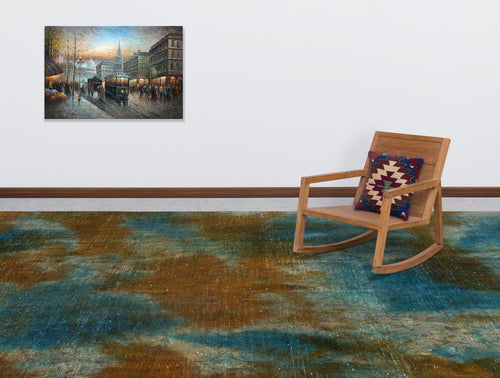 Load image 1 in gallery view. Blue and brown abstract distressed rug in a room with a wooden rocking chair and wall art.