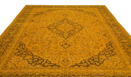 Load image 1 in gallery view. Mustard yellow traditional rug with a dark brown central medallion and intricate floral border on a white background.