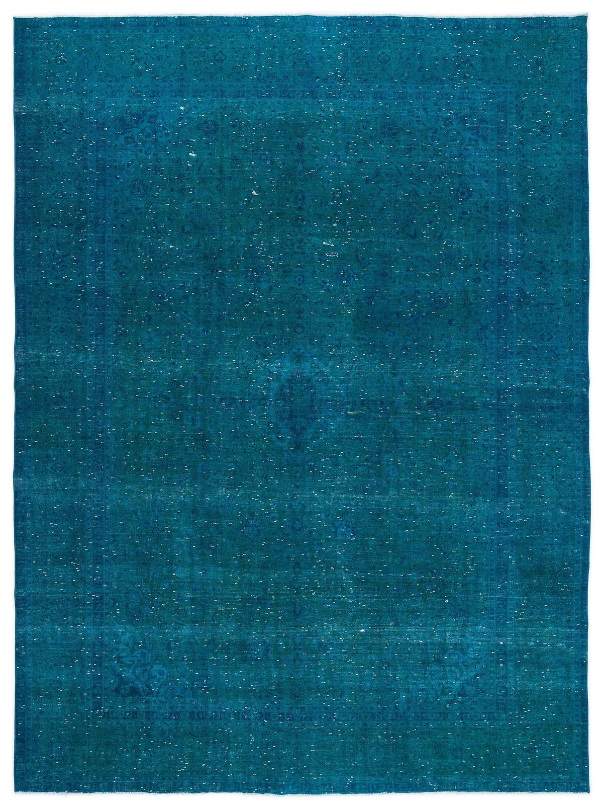 Teal distressed area rug with a faint traditional medallion pattern and white speckled texture on a white background.