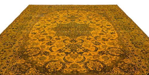 Load image 1 in gallery view. Mustard yellow and dark olive traditional rug with a central floral medallion and intricate scrolling vine border.