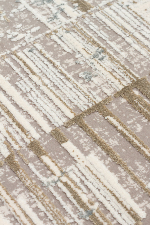 Load image 1 in gallery view. Taupe and cream rug with a high-low pile featuring an abstract linear grid pattern.