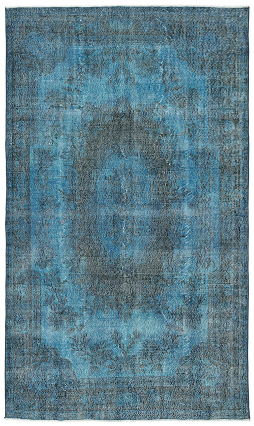 Load image 1 in gallery view. Distressed blue and charcoal area rug with a faded traditional medallion pattern and a bordered edge.