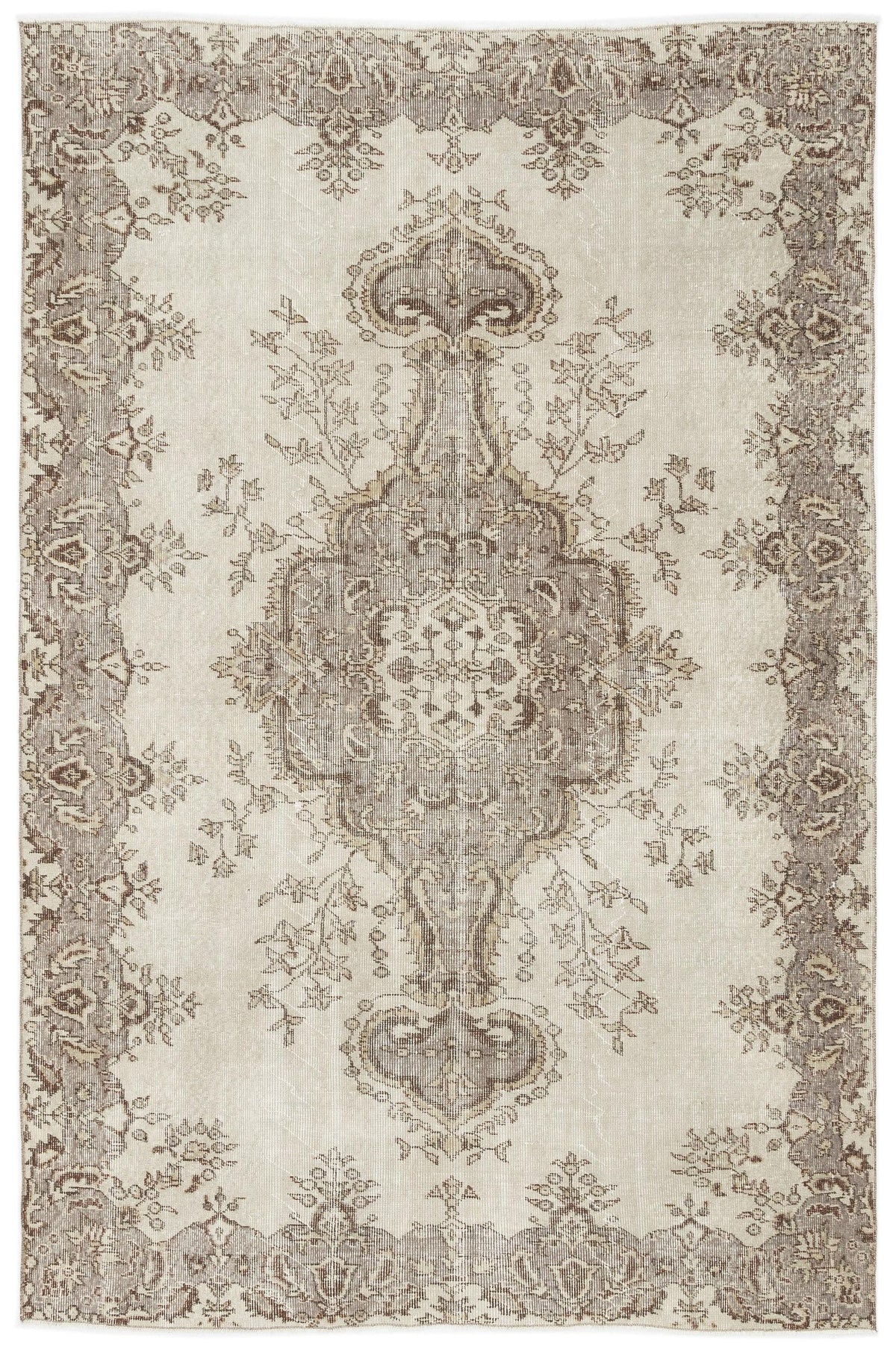 The Luboane Vintage Medallion Rug (6'1 x 9'1) features a rectangular shape with an ornate, symmetrical floral and vine pattern in beige and tan, a detailed central medallion, and a decorative border.
