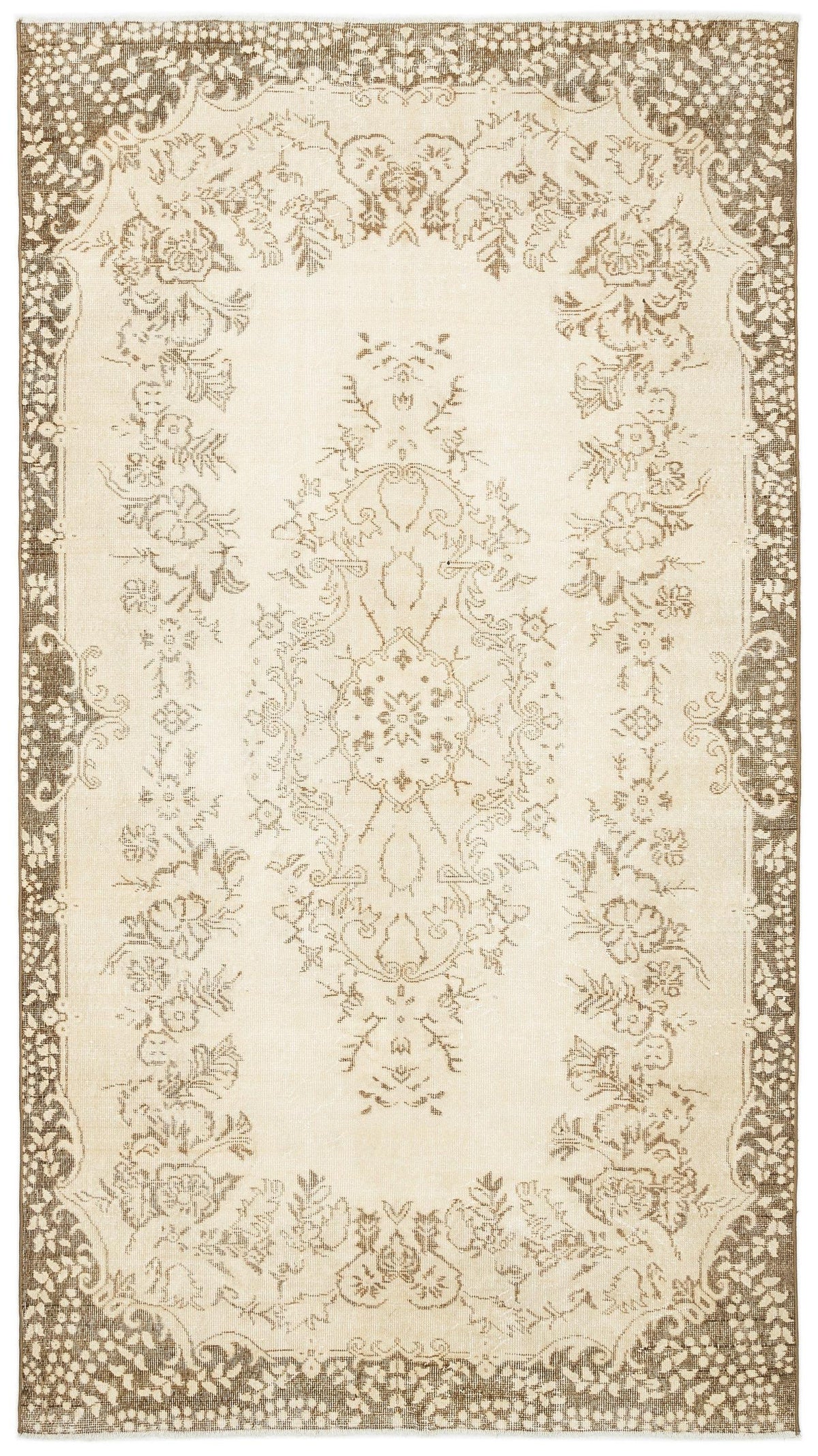 Beige and brown vintage-style rug with a central floral medallion and ornate decorative borders.
