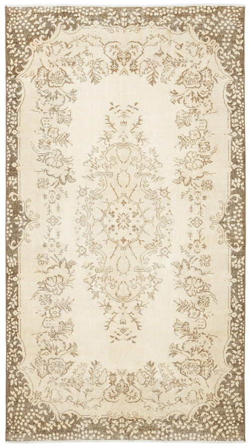 Load image 1 in gallery view. Beige and brown vintage-style rug with a central floral medallion and ornate decorative borders.