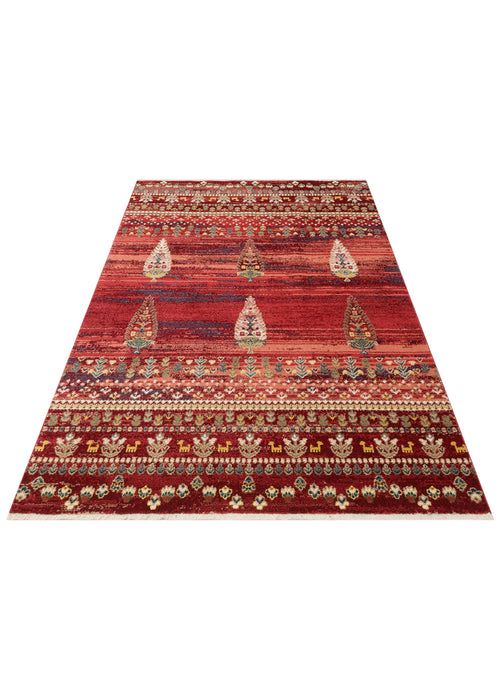 Load image 1 in gallery view. Red rug with a distressed texture, featuring rows of traditional floral motifs and geometric borders on a white background.