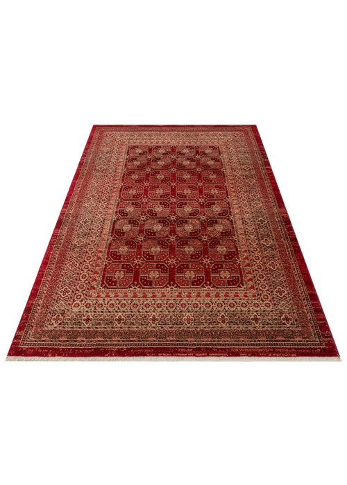 Load image 1 in gallery view. Red and beige traditional rug with a repeating geometric medallion pattern and a decorative border, white background.