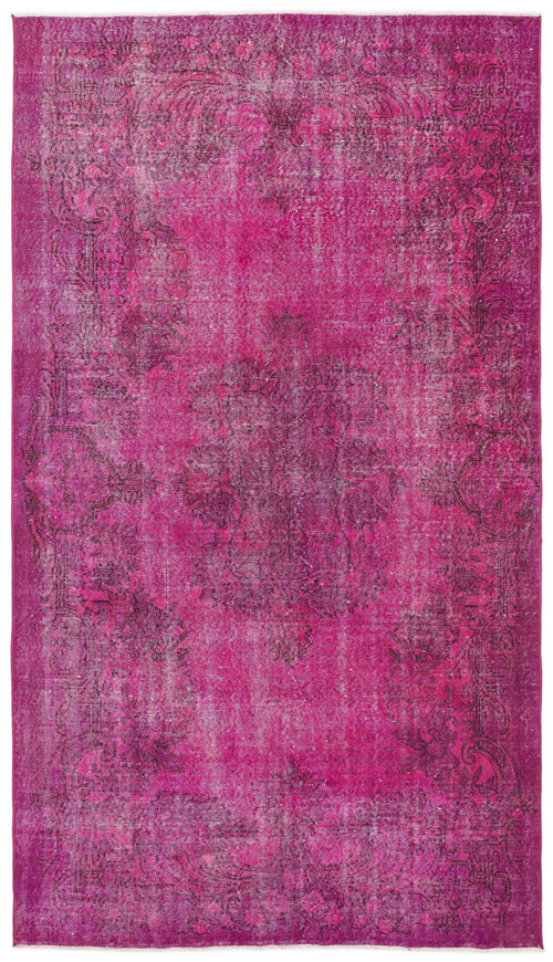 Load image 1 in gallery view. Magenta distressed vintage-style rug with a dark floral medallion and ornate border.