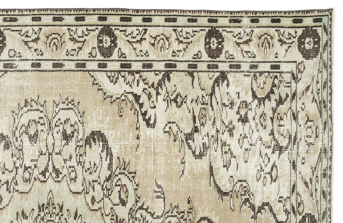 The Vaerail Vintage Medallion Rug (6'3" x 8'9") features a beige and cream palette with ornate floral and vine patterns, plus a decorative border adorned with circular motifs and geometric accents.