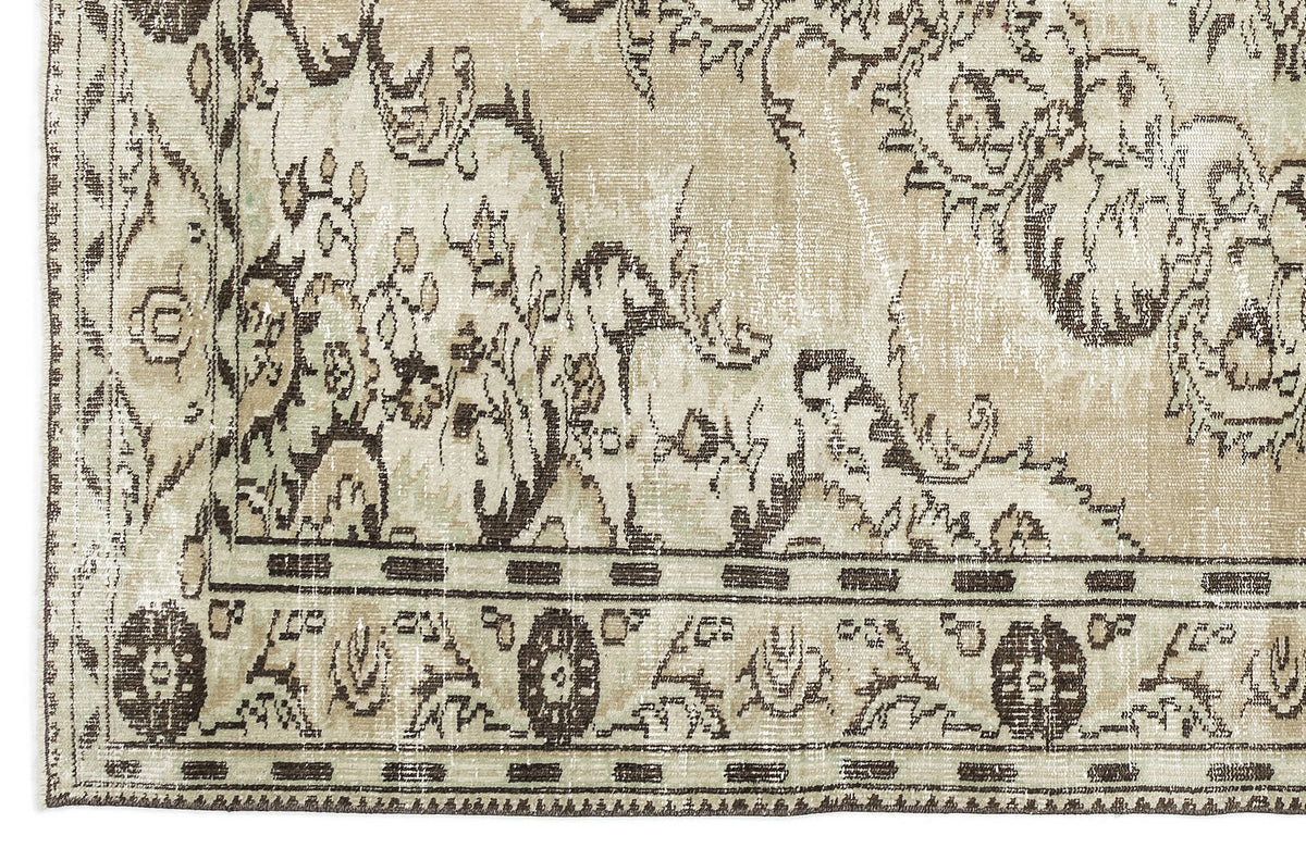 Corner of the Vaerail - Vintage Medallion Rug (6'3" x 8'9") with a beige background, dark brown floral and vine motifs, and a decorative border with stylized flowers and leaves.