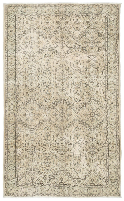 Load image 1 in gallery view. Beige and charcoal distressed area rug with a traditional floral medallion pattern and a decorative border.