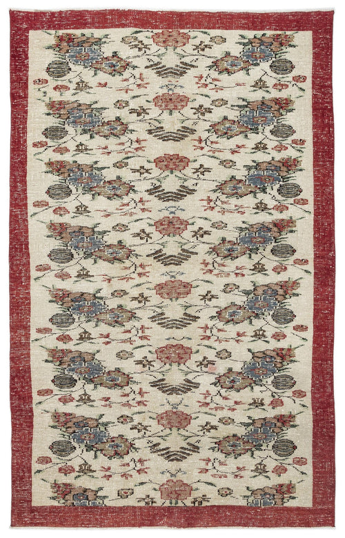 Load image 1 in gallery view. Cream rug with a red border and a repeating floral pattern in red, blue, and green on a white background.