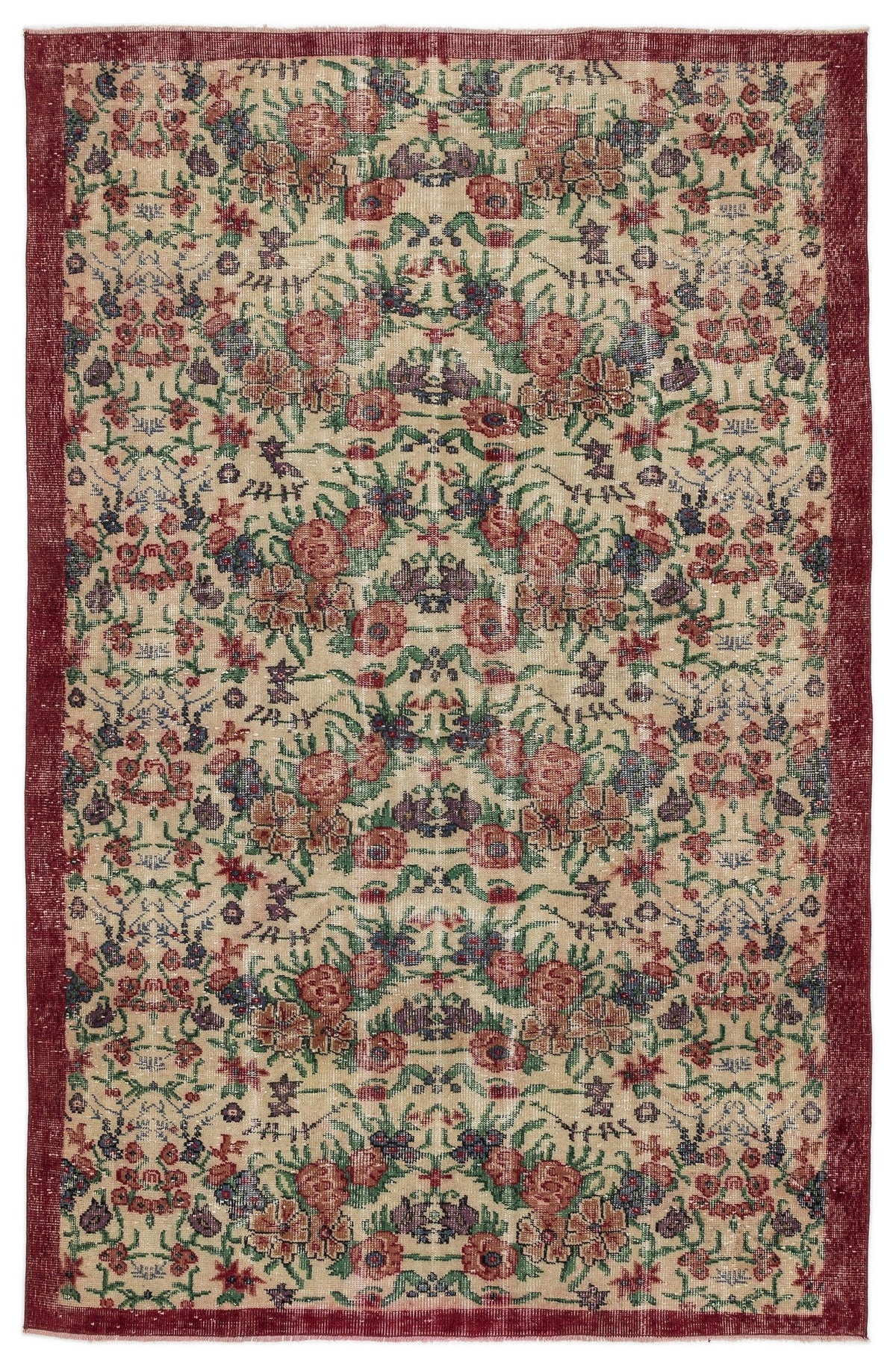 Beige rug with a distressed floral pattern in red, green, and blue, featuring a wide dark red border.