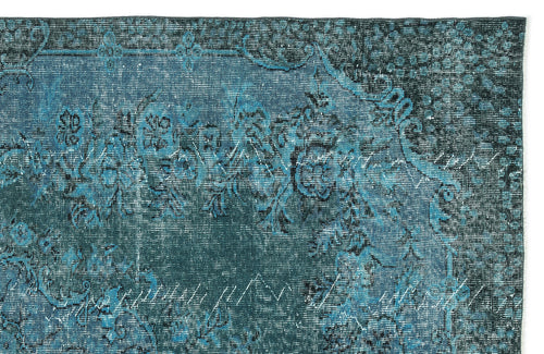 Load image 1 in gallery view. Teal and dark blue distressed rug with a faded traditional floral medallion pattern.