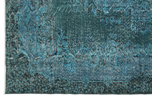 Load image 1 in gallery view. Teal and black distressed rug with a traditional floral medallion pattern and fringed edge.