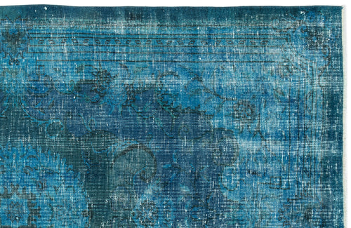 Load image 1 in gallery view. Deep blue distressed rug with a faded traditional medallion pattern and linear border detail.