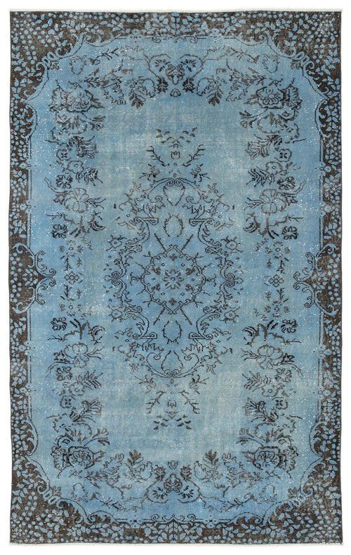 Load image 1 in gallery view. Light blue and charcoal distressed rug with a traditional floral medallion pattern and ornate border.
