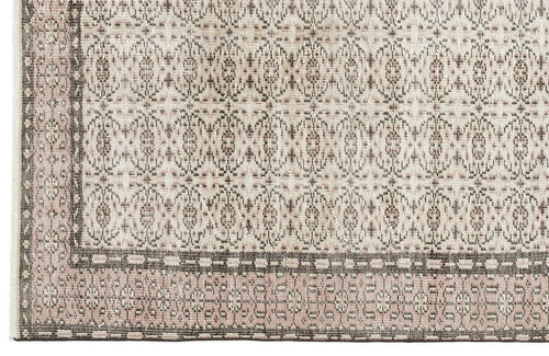 Load image 1 in gallery view. Beige and taupe rug with a repeating medallion pattern and a dark geometric border.