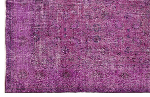 Load image 1 in gallery view. Deep purple vintage-style rug with a distressed, faded traditional medallion pattern.