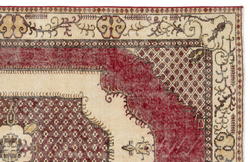Load image 1 in gallery view. Cream and red traditional rug with a distressed geometric medallion pattern and intricate floral border.