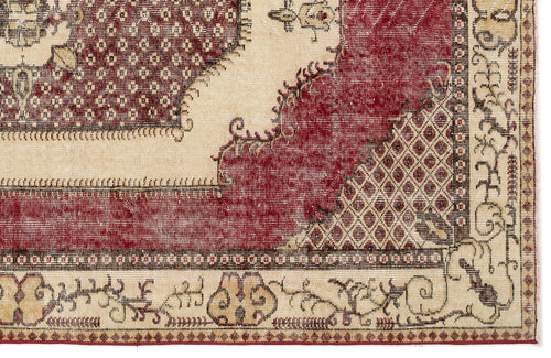 Load image 1 in gallery view. Distressed cream and deep red traditional rug with a geometric lattice pattern and ornate floral border.