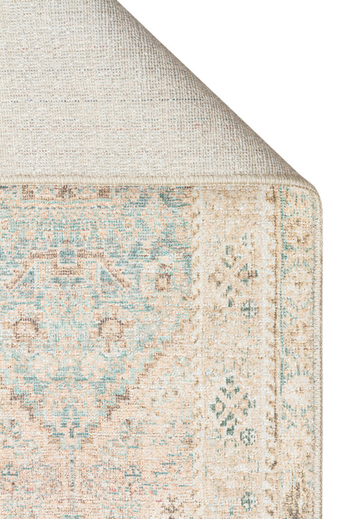 Load image 1 in gallery view. Corner of a beige and teal distressed traditional rug with a geometric medallion pattern, showing the woven backing.