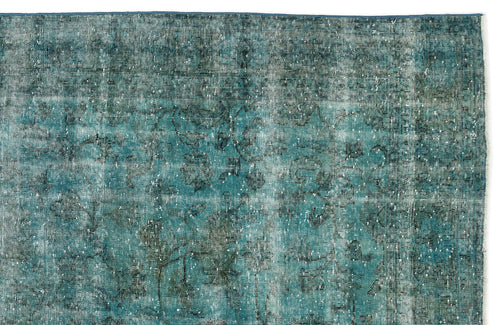 Load image 1 in gallery view. Teal and dark blue distressed rug with a faded, intricate floral medallion pattern on a white background.