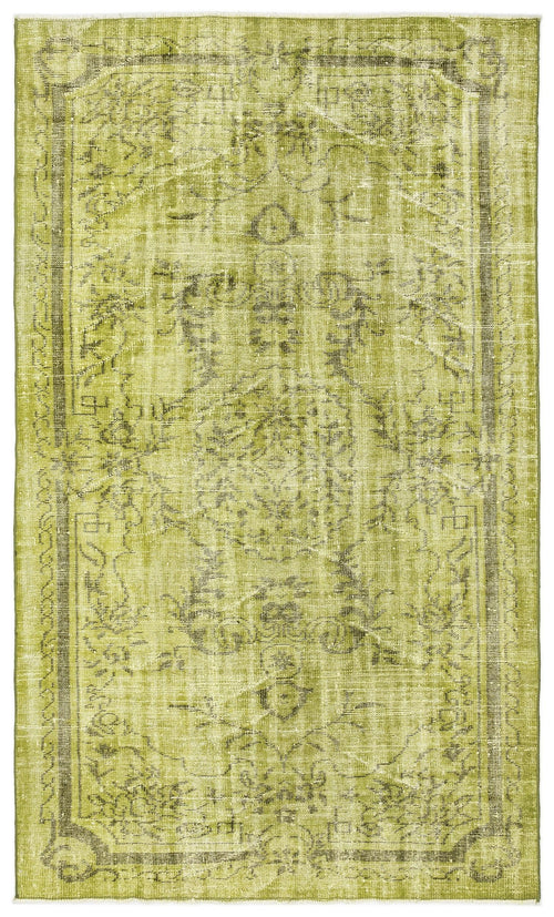 Load image 1 in gallery view. Chartreuse and olive green vintage-style rug with a distressed traditional medallion pattern.