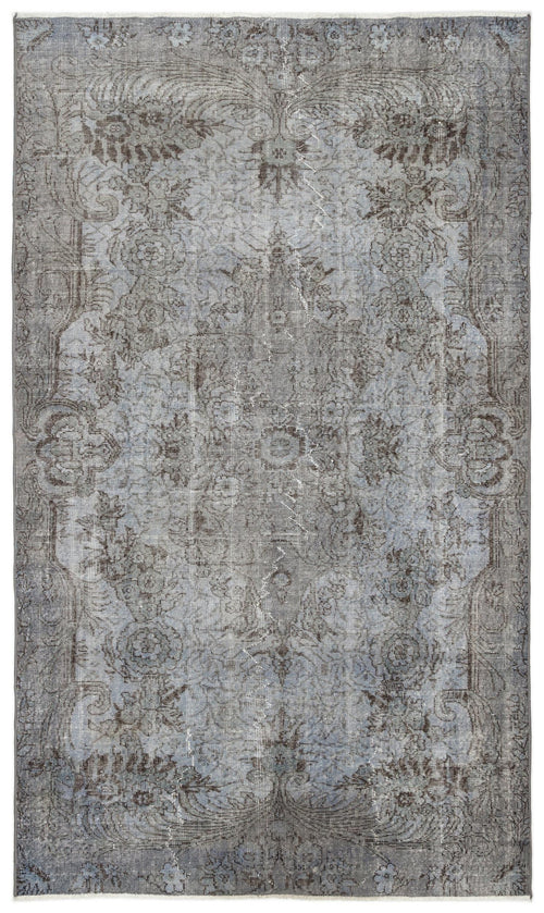Load image 1 in gallery view. Grey and slate blue distressed traditional rug with a faded floral medallion pattern.