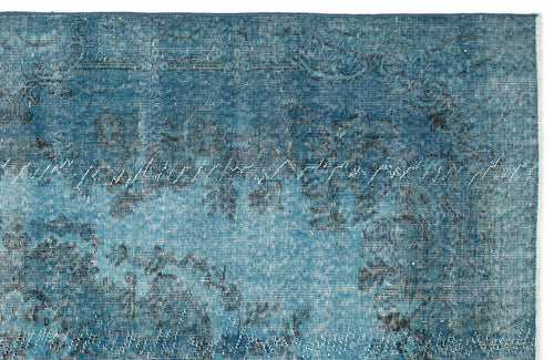 Load image 1 in gallery view. Teal and blue distressed rug with a faded traditional floral medallion pattern on a white background.