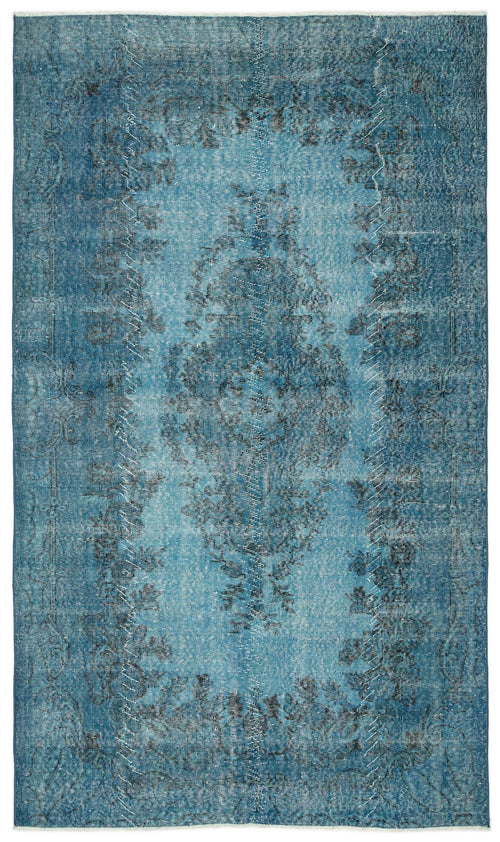 Load image 1 in gallery view. Distressed teal and blue rug with a faded central medallion and floral border pattern.