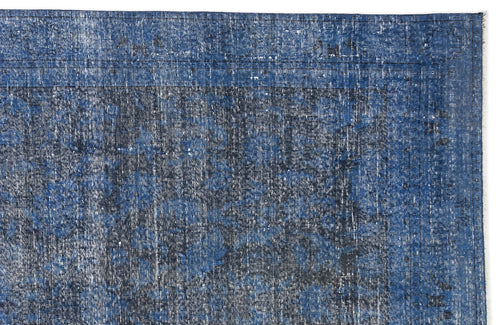 Load image 1 in gallery view. Navy blue and black distressed traditional rug with a faded, worn-in texture and a bordered medallion pattern.