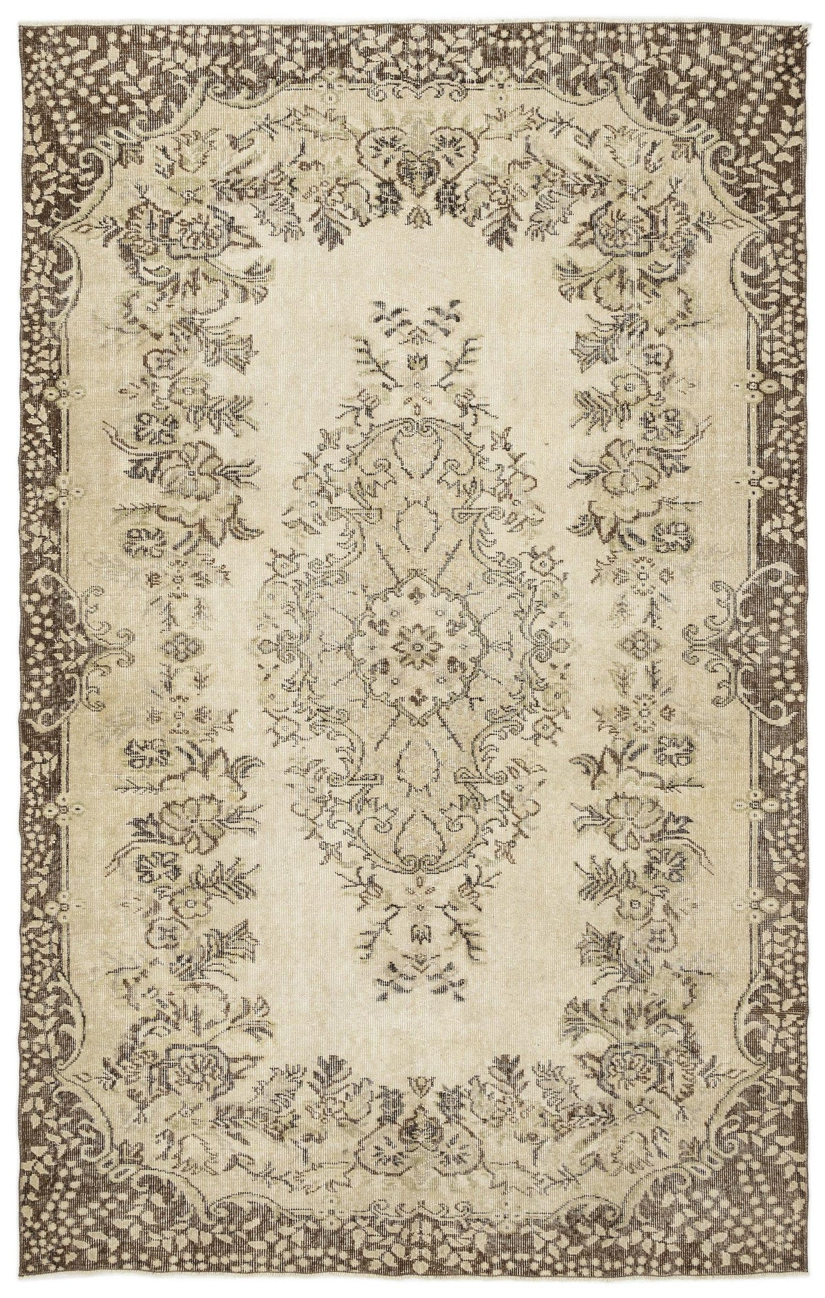 The Coveis Vintage Medallion Rug (5'10 x 9'4) is a rectangular beige rug with an ornate, symmetrical floral pattern in brown and cream hues, highlighted by a decorative border and a detailed central medallion.